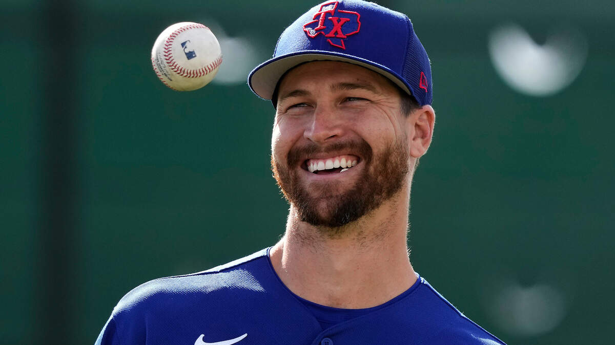 Texas Rangers pitcher Jacob deGrom waits to throw during spring training in Surprise, Ariz. Fans can get a deGrom bobblehead on June 16.