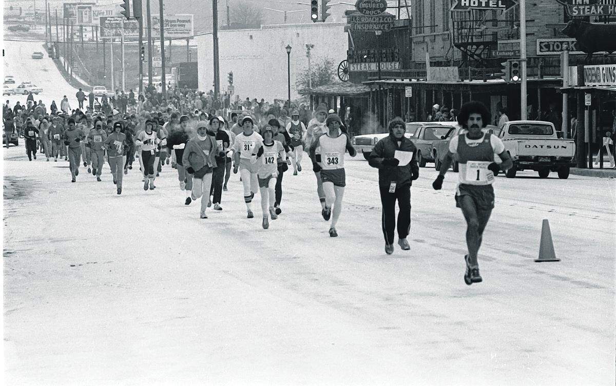 Feb. 17, 1979: Cowtown Marathon gets started in the Fort Worth Stockyards area along Exchange Avenue in ice and snow. Bill Parmelee (#343) came in as winner.