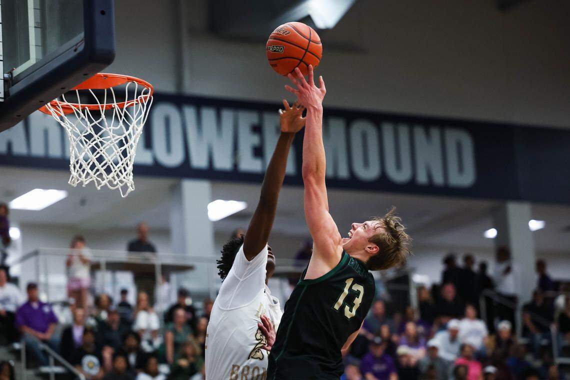 Birdville guard Avery Webb (13) puts up a shot toward the basket over a leaping Denton defender in a UIL Class 5A Division I regional final at Flower Mound High School in Flower Mound, Texas, Friday, March 6, 2026.