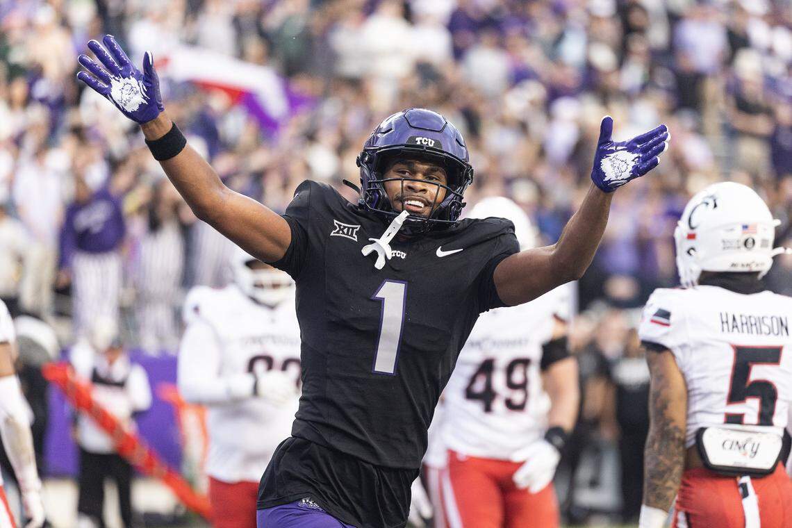 TCU wide receiver Eric McAlister (1) celebrates after scoring a touchdown in the first half of a Big XII conference game between the TCU Horned Frogs and the Cincinnati Bearcats at Amon G Carter Stadium in Fort Worth on Saturday, Nov. 29, 2025.