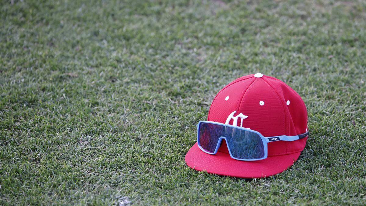The cap of Zach Goldstein lays on the turf during Grapevine Mustang baseball practice at Grapevine High School in Grapevine, Texas, Tuesday Feb. 17, 2026.