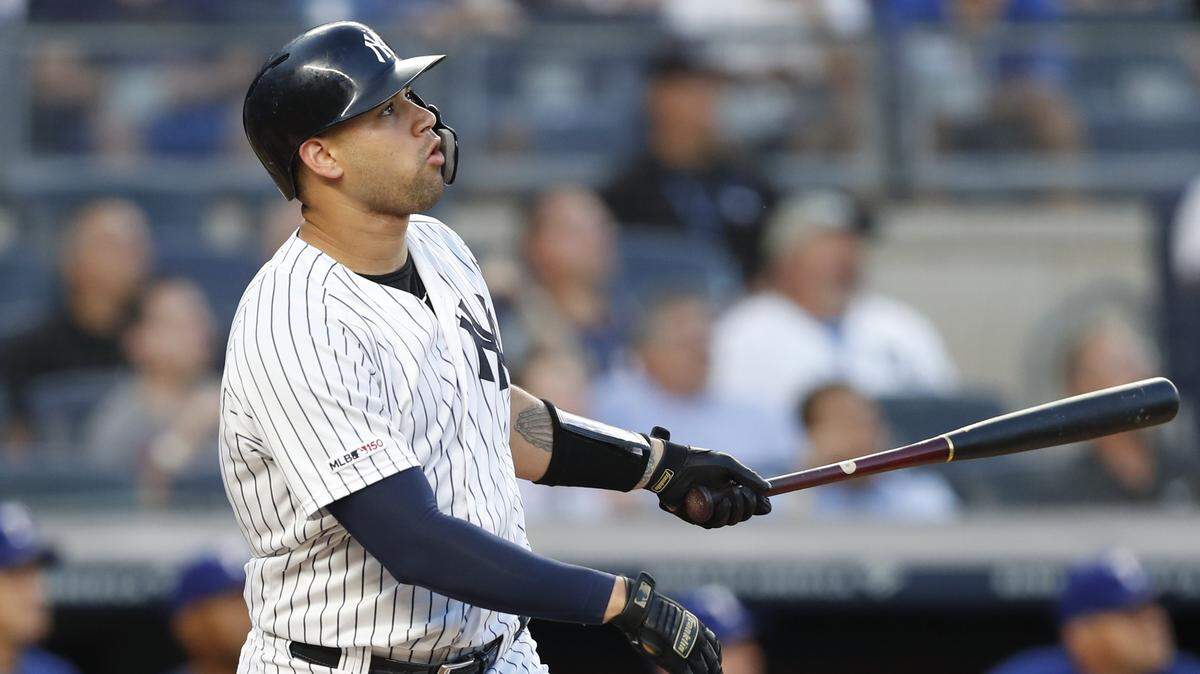 New York Yankees catcher Gary Sanchez watches his two-run home run Tuesday during the first inning of their win over the Rangers.