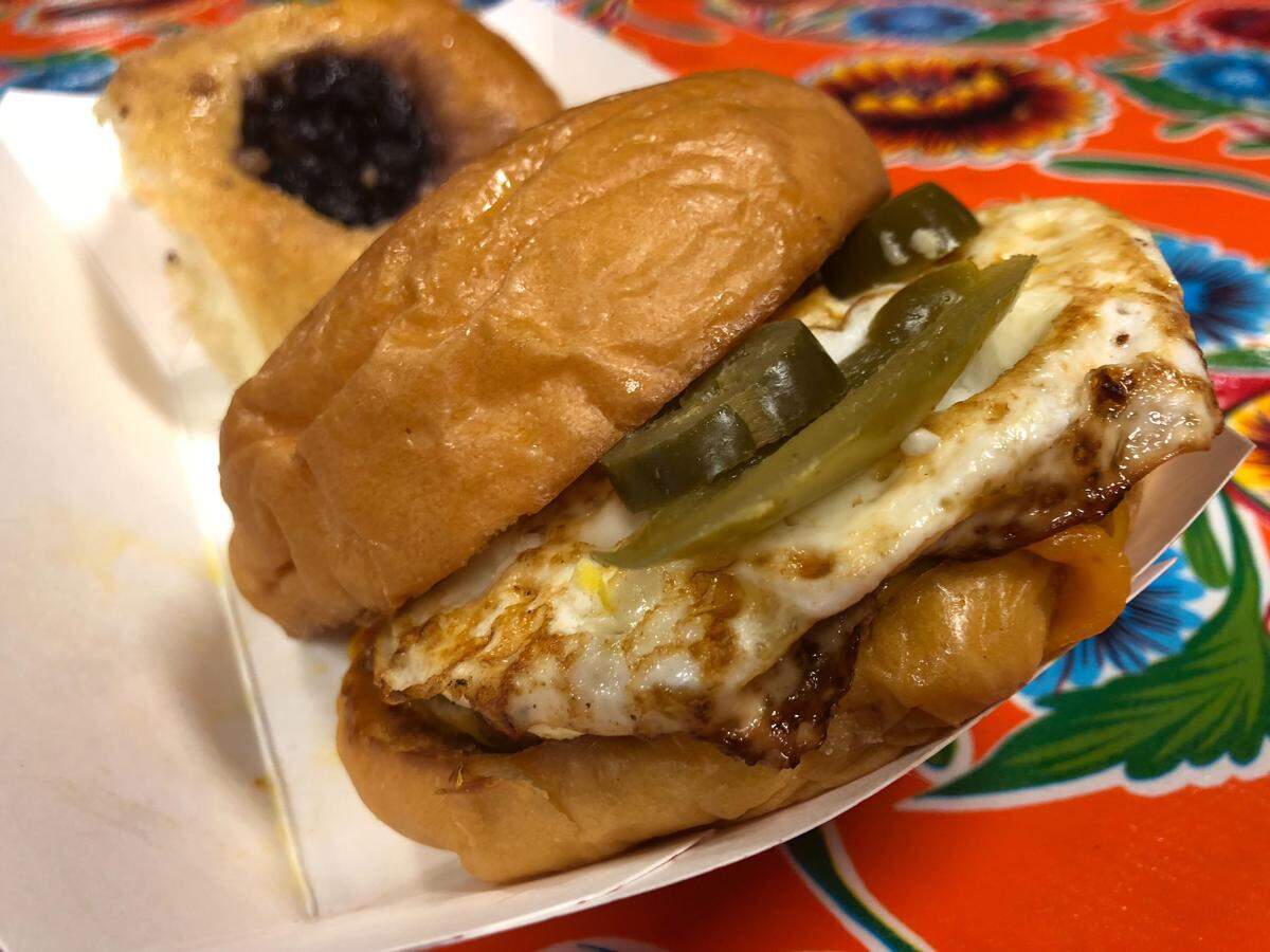 A Pearl Snap Kolaches sausage-and-egg sandwich with jalapenos.