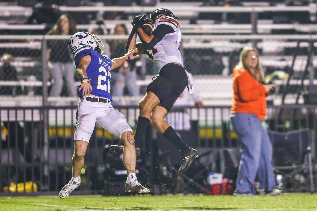Decatur receiver makes an incredible catch behind the back of Springtown defensive back Caden Rodgers at the Friday, Nov. 1 game at Decatur. Special to the Star-Telegram / Tom Marvin