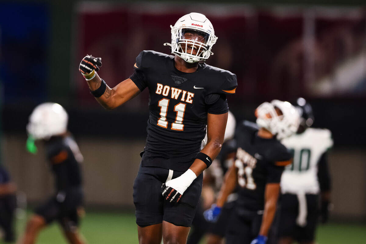 Arlington Bowie linebacker Marquee Haynes pumps his fist in celebration after a turnover forced by the defense in a bi-district playoff game at Choctaw Stadium in Arlington, Texas on Nov. 14, 2025.