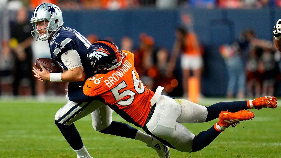 Dallas Cowboys veteran backup quarterback Cooper Rush (10) struggled in the first half of the team’s first preseason game on Saturday night in Denver.