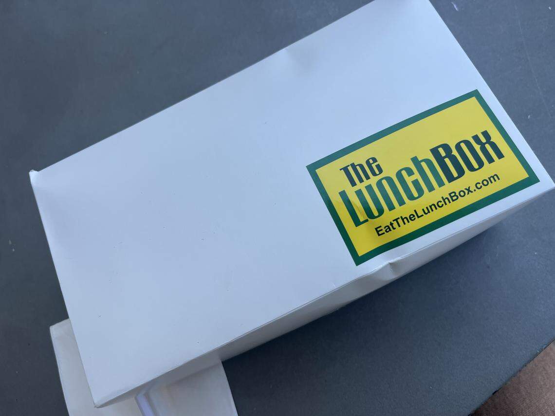 The Lunch Box in Fort Worth serves lunch box combos for $20 in their signature white boxes.