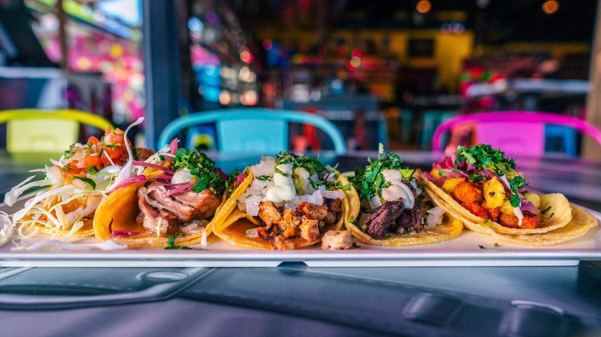 El Chingón, a West 7th bar based in San Diego, offers a “taco flight” for National Taco Day.