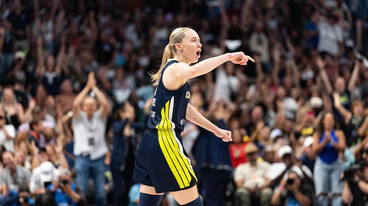 Dallas Wings guard Paige Bueckers reacts after hitting a 3-point shot at the halftime buzzer of a WNBA game between the Dallas Wings and Indiana Fever at the American Airlines Center in Dallas on Friday, June 27, 2025.