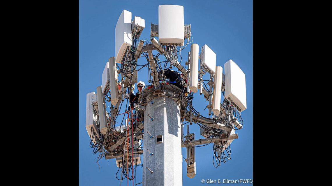 Three people, including a critically injured man, were rescued from the top of a cell tower in Burleson on Friday afternoon, officials say.