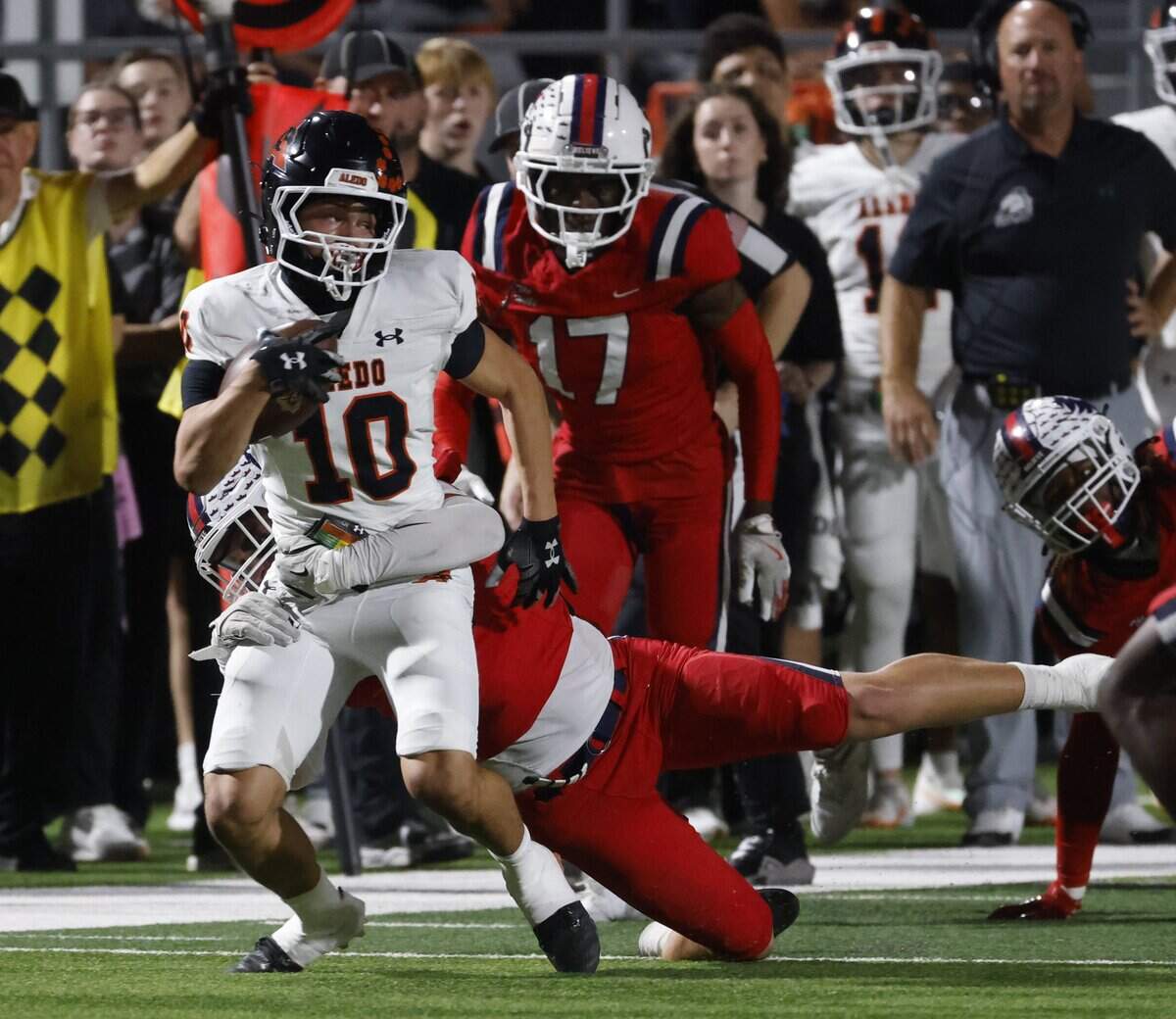Aledo wide receiver Bayne Martin (10) is brought down after a short gain during the first half of a UIL football game against North Richland Hills Richland on Thursday, October, 23, 2025 at Birdville FAAC Stadium in North Richland Hills, Texas.