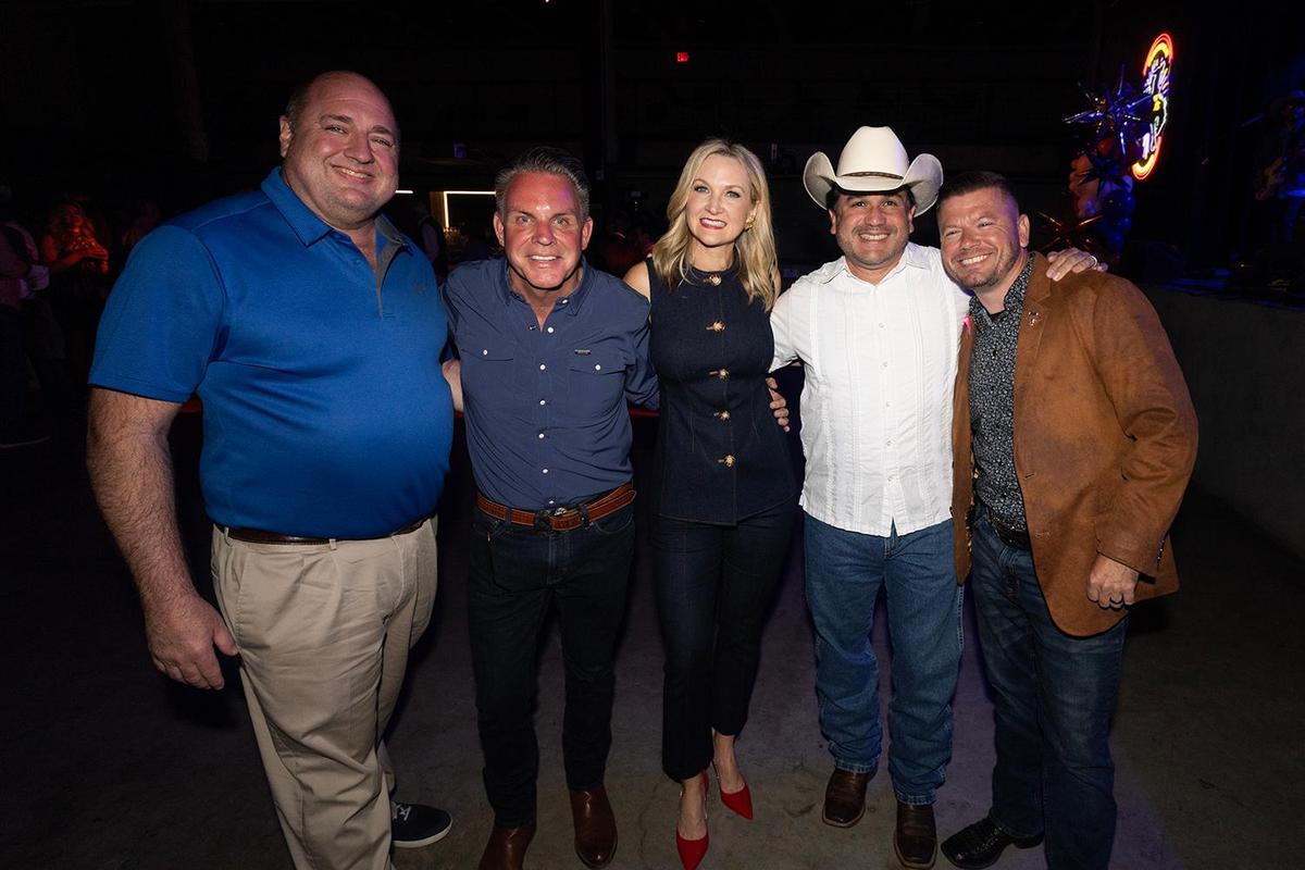 Newly elected city councilmembers Alan Blaylock, Michael Crain, Mayor Mattie Parker, Carlos Flores, and Charlie Lauersdorf are photographed during Mayor Mattie Parker’s election party at Tannahill’s Tavern & Music Hall in the Fort Worth Stockyards on Saturday, May 3, 2025.