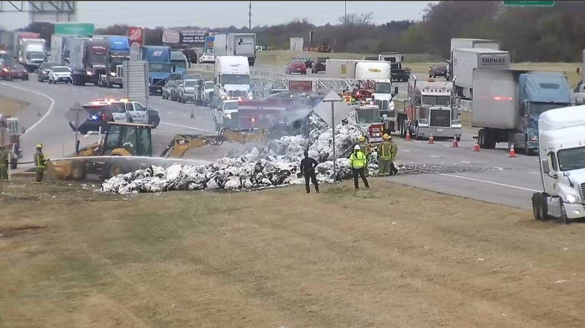 Fire officials in Grand Prairie said the fire is considered a major accident on I-20 at Beltline Road involving a truck carrying bales of cotton.