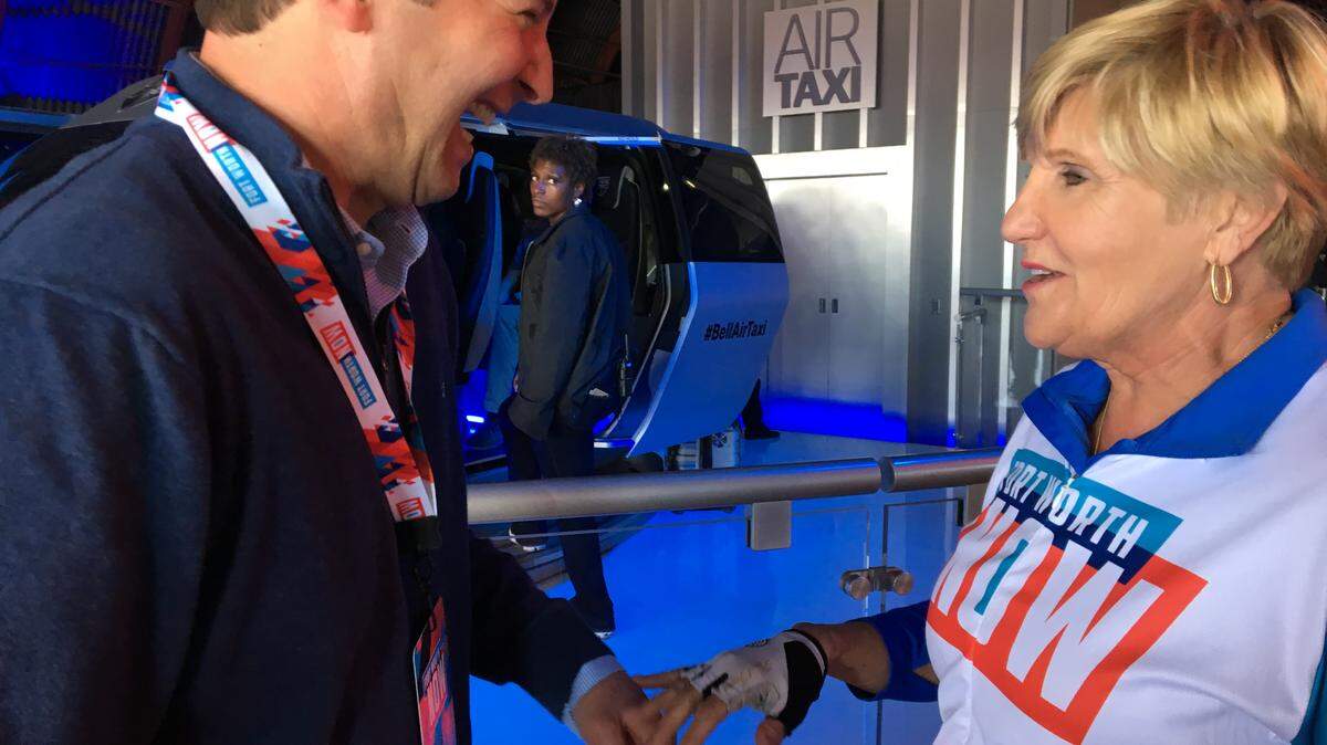 Rep. Craig Goldman, R-Fort Worth, and Fort Worth Mayor Betsy Price chat in front of Bell’s flying taxi exhibit during a “Fort Worth Now” exhibition at South by Southwest in Austin.  The two-day exhibit, aimed at promoting the North Texas city before thousands of international visitors, ends Wednesday.