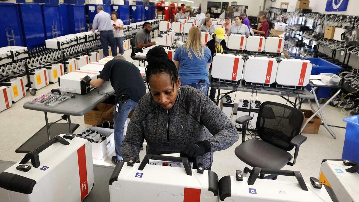 Sharon Smith, a Tarrant County Election Commission employee, tests voting machines for accuracy on Friday, September 23, 2022, at the Tarrant County Elections Administration Office. For the first time ever the public was invited to fill out test ballots in an effort to boost confidence in the system.