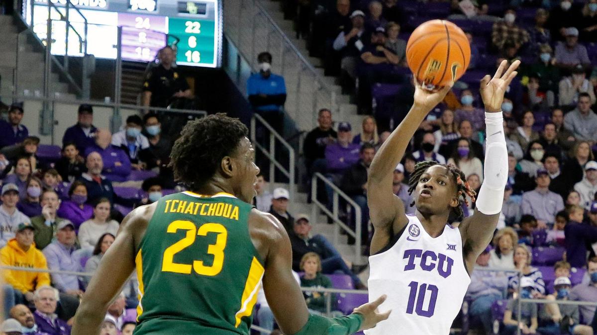TCU guard Damion Baugh (10) shoots over Baylor forward Jonathan Tchamwa Tchatchoua (23) on Jan. 8 in Fort Worth. Baugh had a career-high 23 points and seven steals Saturday against Iowa State.