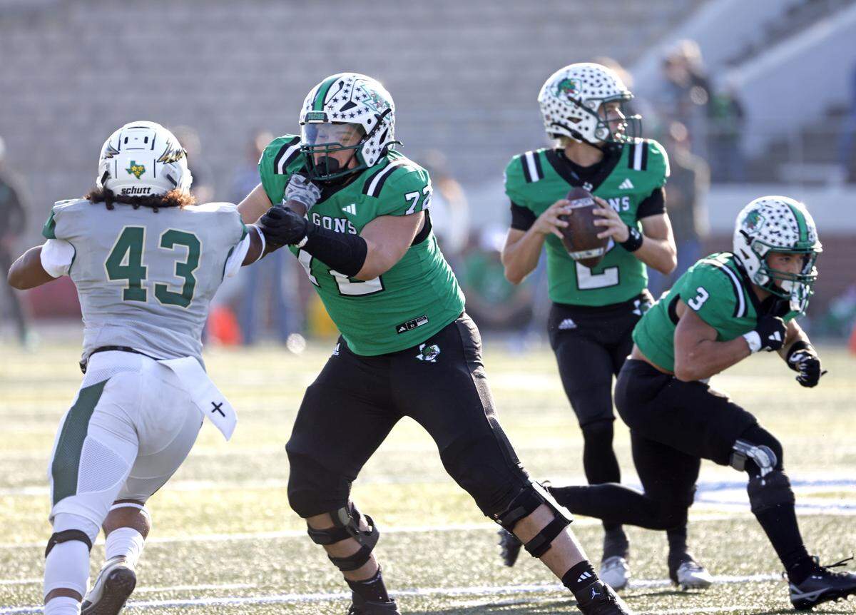 Southlake Carroll offensive lineman Tristan Dare (72) works against DeSoto outside linebacker DJ Rumph (43) during the first half of a UIL Class 6A Division II semifinal on Saturday Dec. 13, 2025 at Vernon Newsom Stadium in Mansfield, Texas.