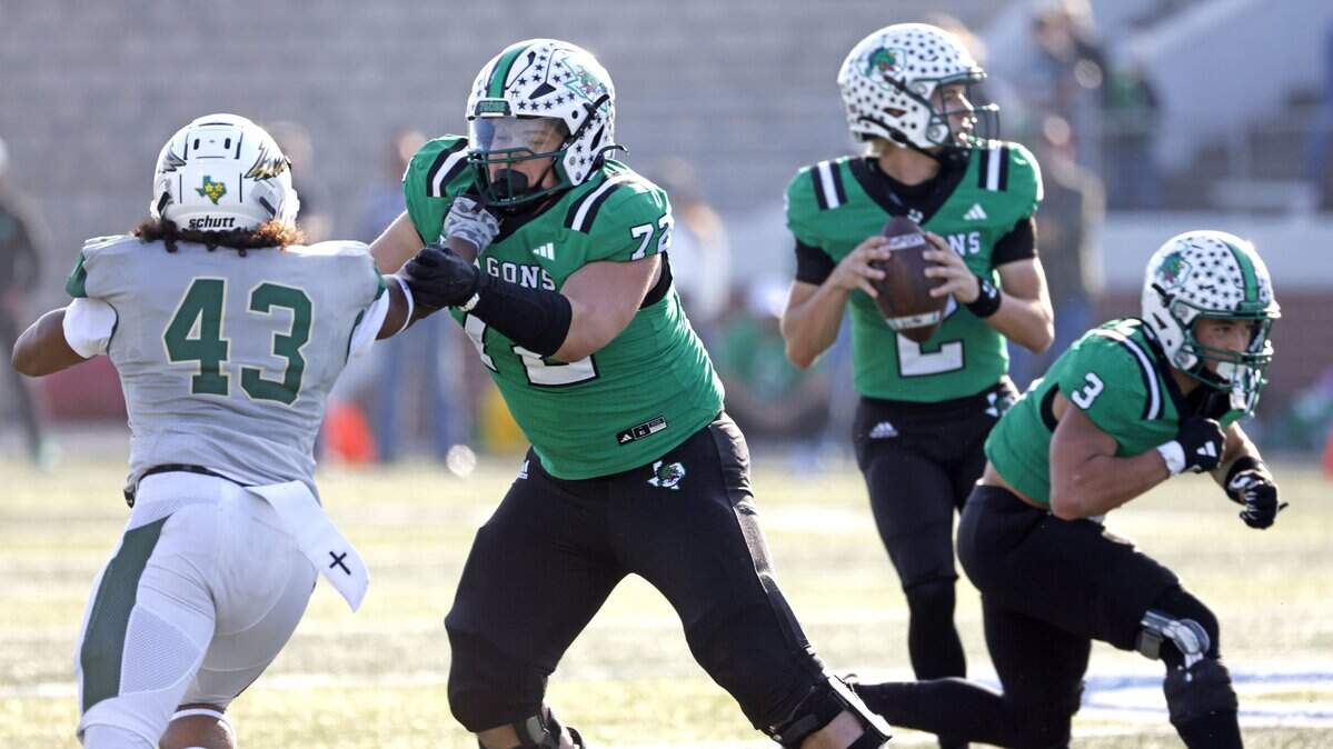Southlake Carroll offensive lineman Tristan Dare (72) works against DeSoto outside linebacker DJ Rumph (43) during the first half of a UIL Class 6A Division II semifinal on Saturday Dec. 13, 2025 at Vernon Newsom Stadium in Mansfield, Texas.