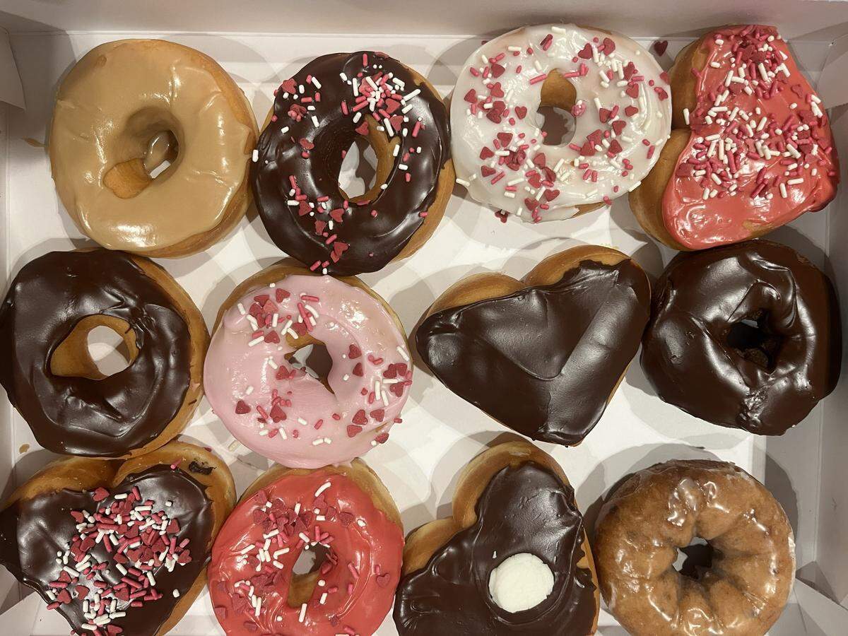 A dozen Valentine’s Day themed Dunkin’ Donuts.