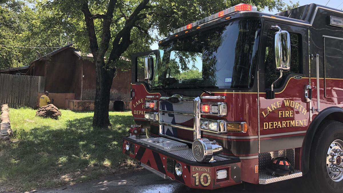 The Lake Worth Fire Department responds to a fatal fire in the 4600 block of Williams Spring Road on Friday. The elderly man who lived in the home was killed and a dog was rescued in good condition.