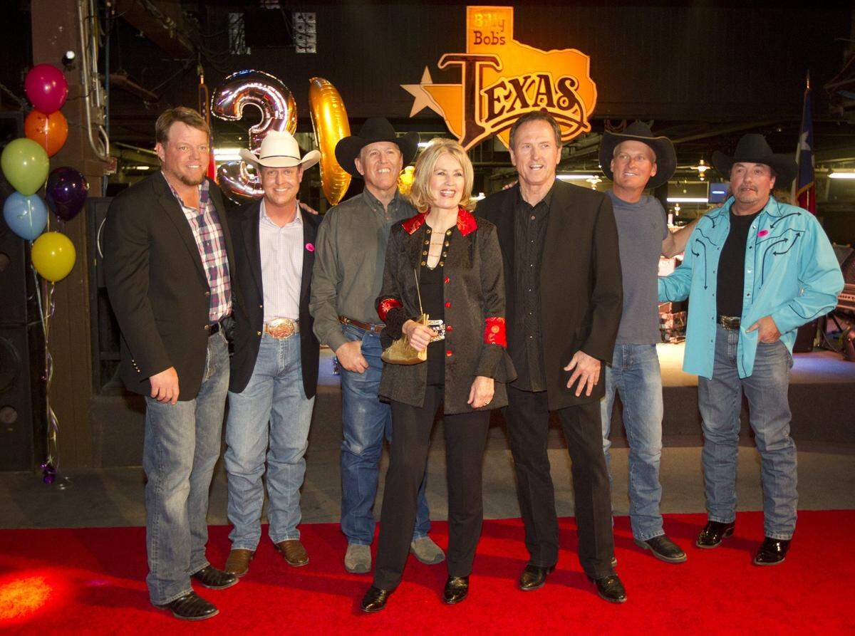 March 31, 2011: From left, Pat Green, Blaine Gray, Dan Roberts, Janie Fricke, Rudy Gatlin, Kevin Fowler and Rob Dixon pose on the red carpet as Billy Bob’s Texas celebrated its 30th anniversary