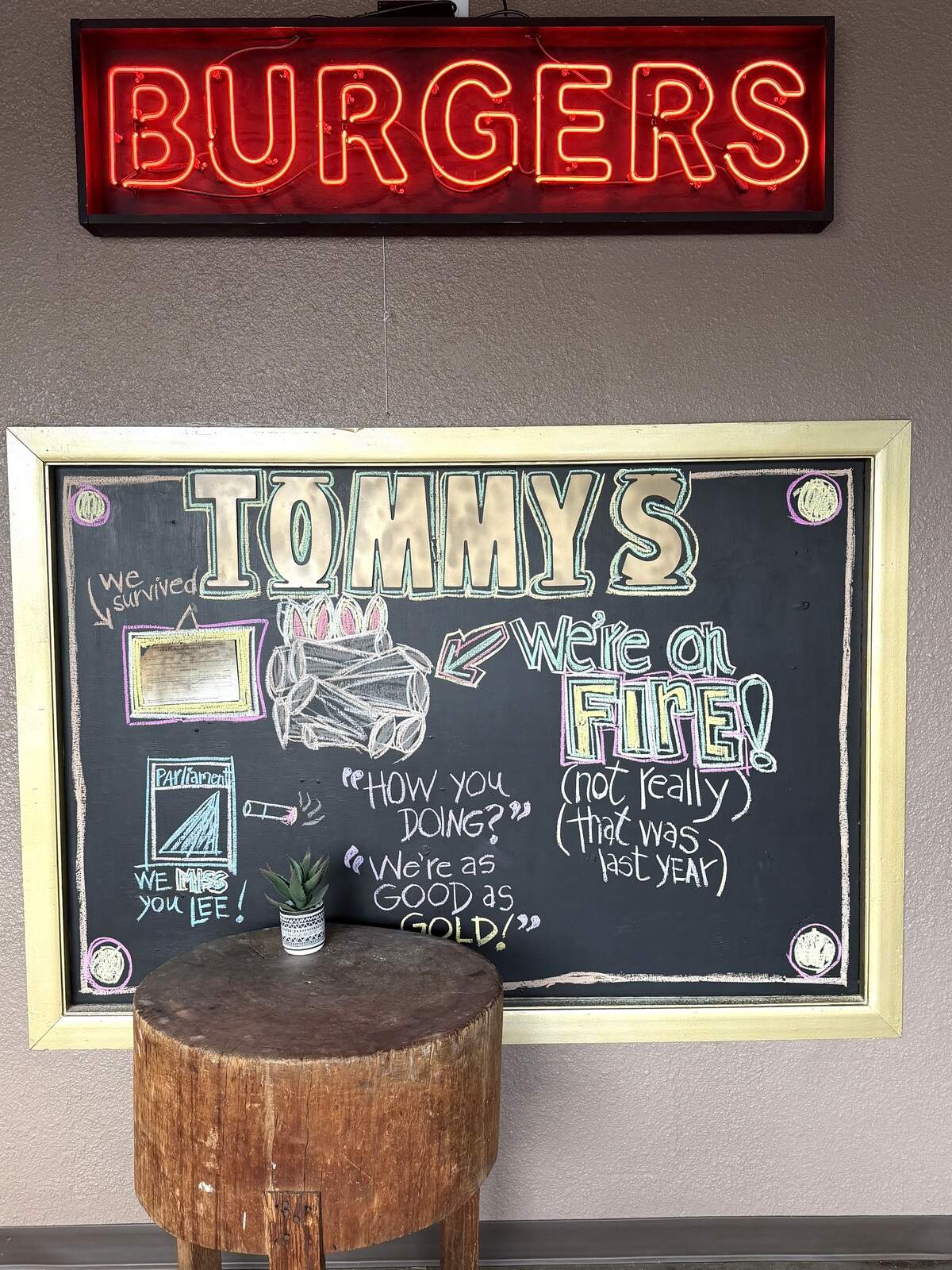 A new neon in the remodeled Tommy’s Hamburgers was added 24 years ago by co-founder Tommy Smith.