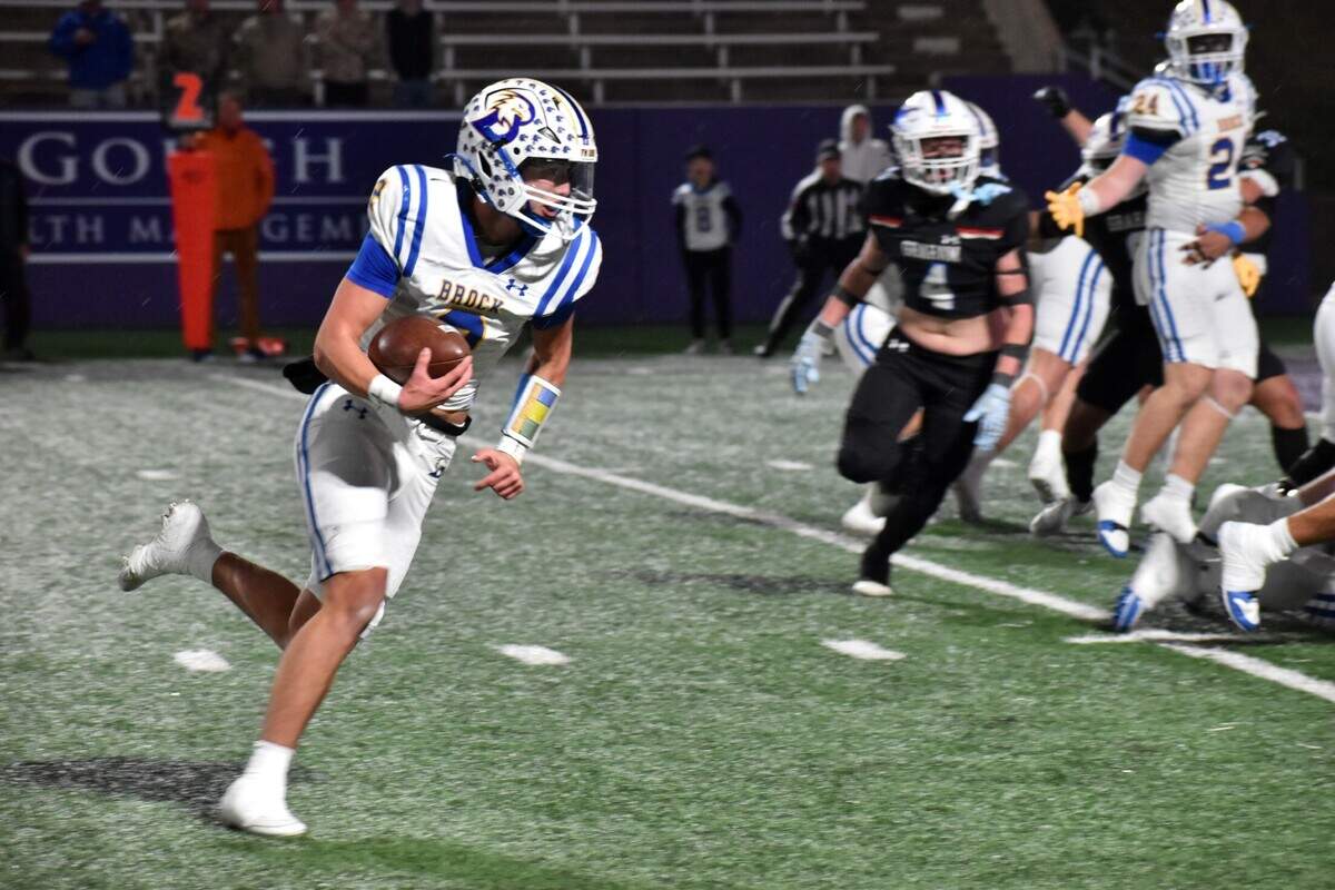 Brock quarterback Brody Woods runs for a 5-yard touchdown in the first quarter of a UIL football Class 4 Division II regional final game against Graham at Tarleton Memorial Stadium on Friday, Dec. 6, 2024.