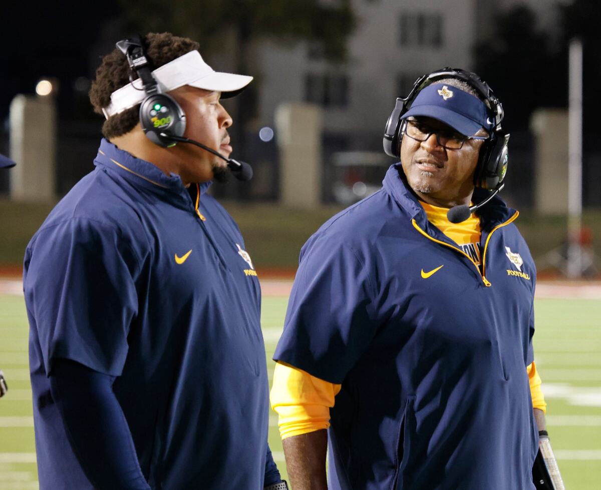 Arlington Heights head coach Curtis James glances to one of his coaches during a District 4-5A D1 football game at Farrington Field in Fort Worth, Texas, Thursday, Oct. 10, 2024. (Special to the Star-Telegram / Bob Booth)