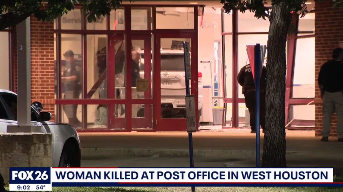 A woman was killed after a driver crashed into a post office building in Texas, police say.