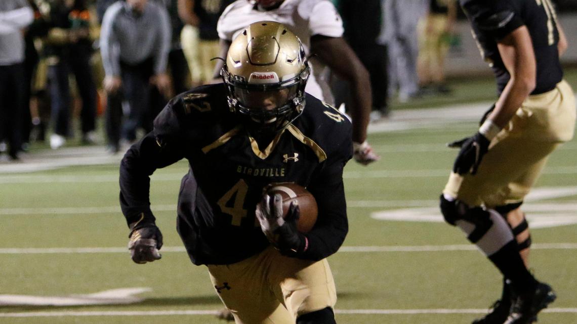 Birdville running back Demarye Walker (42) scores a fourth quarter touchdown to clinch the game for the Hawks. The Saginaw Rough Riders played the Birdville Hawks at Birdville FAAC stadium in North Richland Hills Thursday, November 14, 2019.