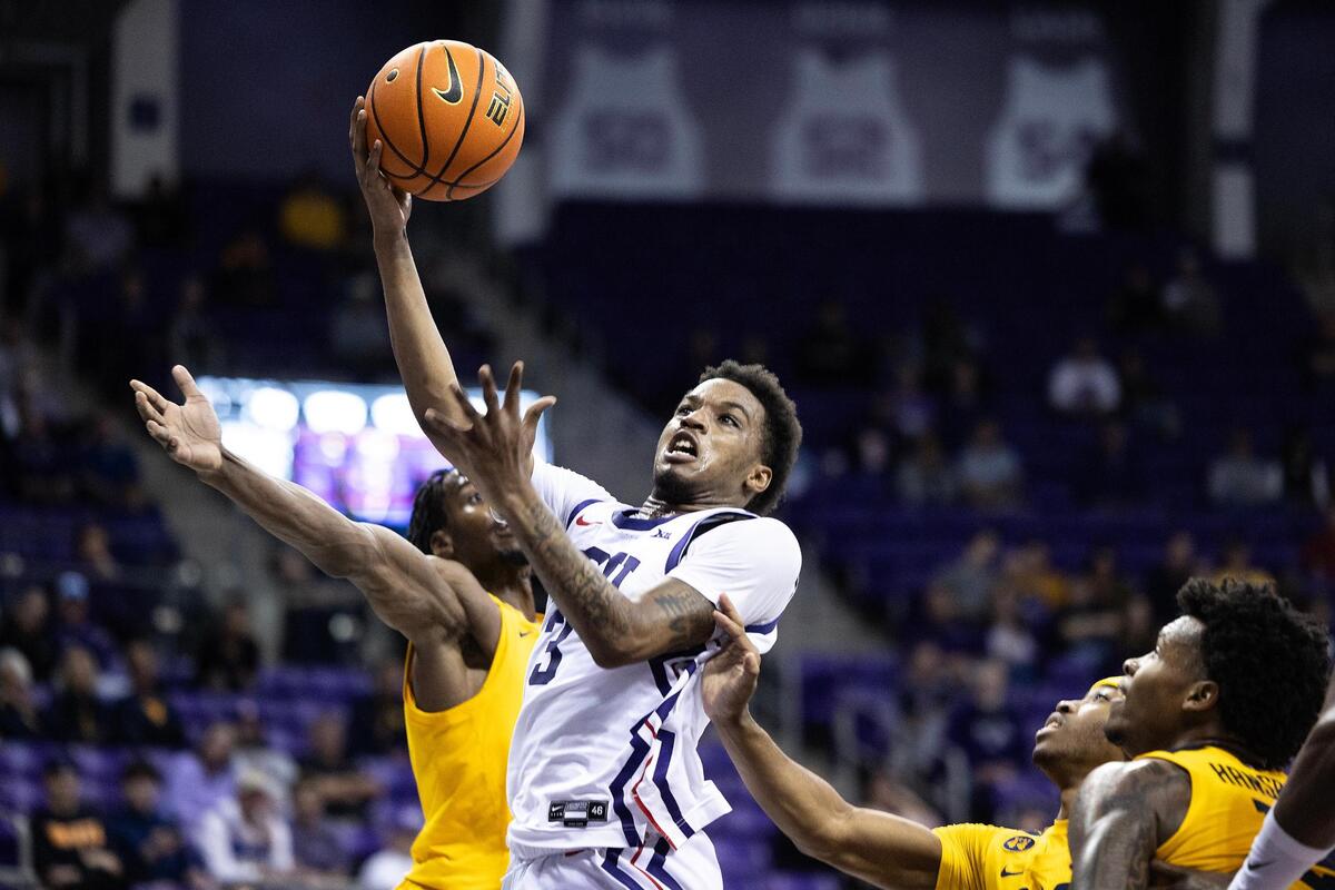 TCU guard Vasean Allette (3) goes up for a layup in the first half of an NCAA game between TCU and West Virginia at Schollmaier Arena in Fort Worth on Wednesday, Feb. 5, 2025.
