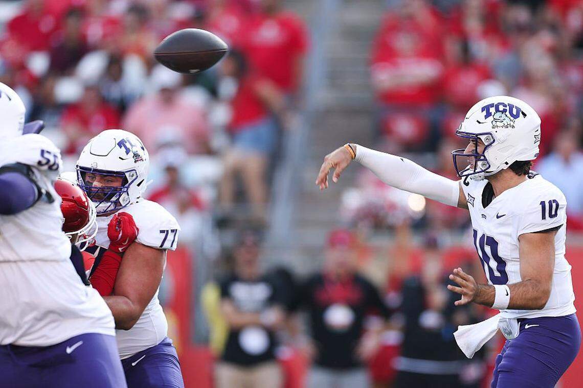 HOUSTON, TEXAS - NOVEMBER 22: Josh Hoover #10 of the Texas Christian University Horned Frogs makes a pass in the first quarter of the game against the Houston Cougars at TDECU Stadium on November 22, 2025 in Houston, Texas. (Photo by Kenneth Richmond/Getty Images)