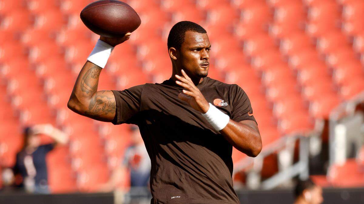 FILE - Cleveland Browns quarterback Deshaun Watson (4) warms up prior to an NFL preseason football game against the Chicago Bears, Saturday Aug. 27, 2022, in Cleveland. Deshaun Watson returned to the Browns’ training facility Monday, Oct. 10, 2022, the quarterback’s next step in his potential return from an NFL suspension. Watson, banned for 11 games for alleged sexual misconduct after being accused by women in Texas of lewd actions during massage therapy sessions, has been away from the Browns since Aug. 30.(AP Photo/Kirk Irwin, File)