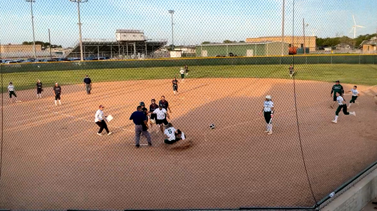 The Mathis High School softball coach was later arrested on an assault charge, Texas officials say.
