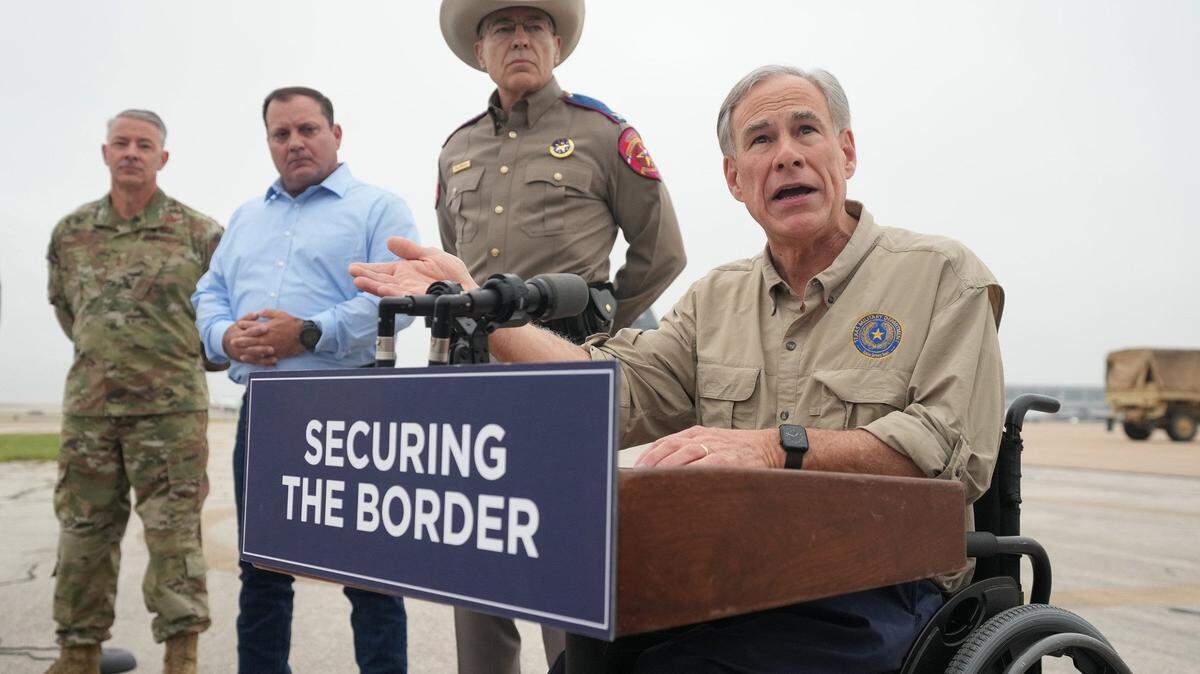 Gov. Greg Abbott speaks at a news conference as Texas Army National Guard troops deploy from Austin-Bergstrom International Airport on Monday May 8, 2023, to the Texas-Mexico border.
