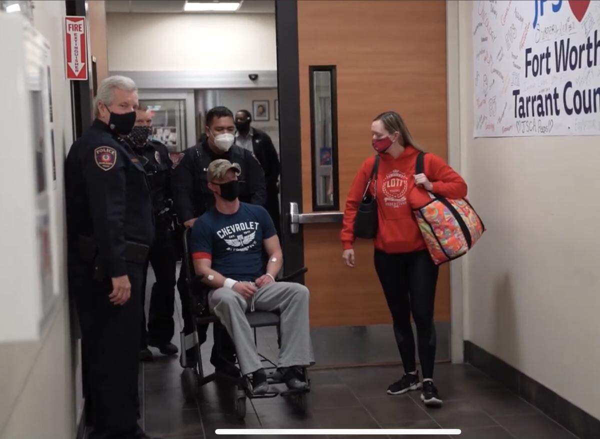 Burleson police Officer Joshua Lott left John Peter Smith Hospital in Fort Worth on April 15, 2021, about 38 hours after he was shot three times during a traffic stop.