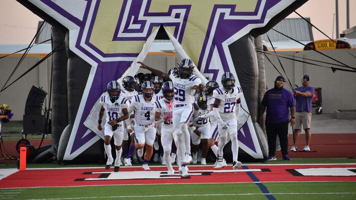 Chisholm Trail runs onto the field during a high school football game against Trimble Tech at Clark Stadium in Fort Worth, Texas Thursday, September 19, 2024.