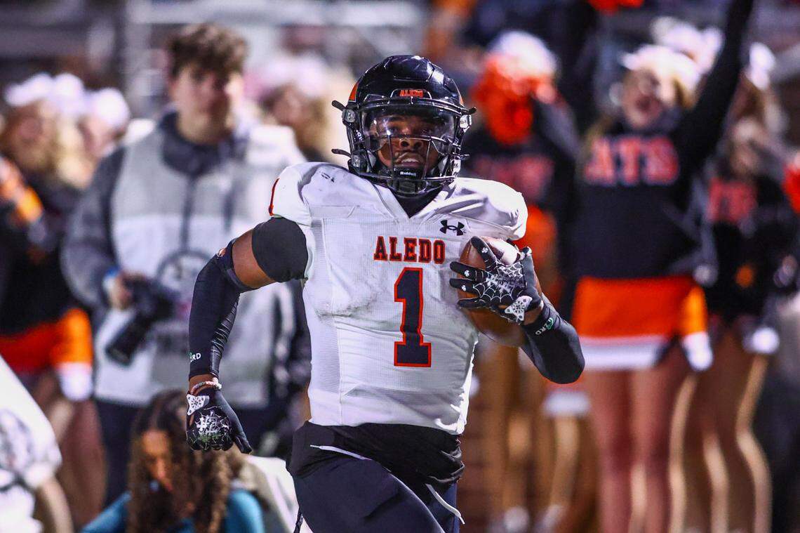 Aledo running back Raycine Guillory Jr. runs down the sideline on his 76-yard touchdown run against Abilene in the Friday, Nov. 22 playoff game at Newsom Stadium in Mansfield. Special to the Star-Telegram / Tom Marvin