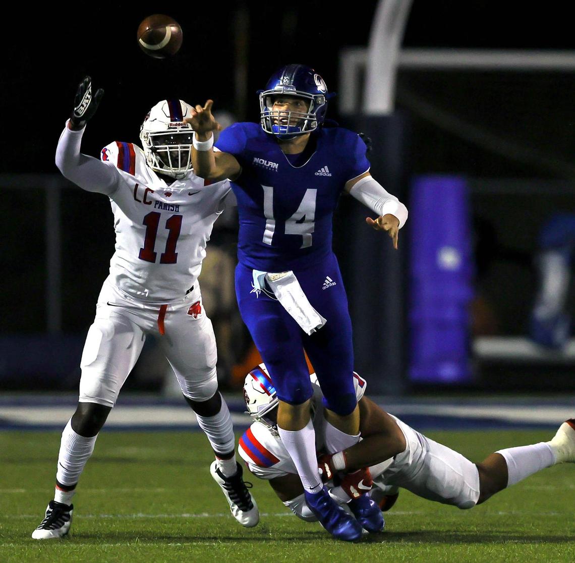 Nolan quarterback Jimmy Taylor (14) just gets off a pass against Parish Episcopal during the first half of a high school football game, November 13, 2020 played at Doskocil Stadium in Fort Worth, Tx. (Steve Nurenberg Special to the Star-Telegram)