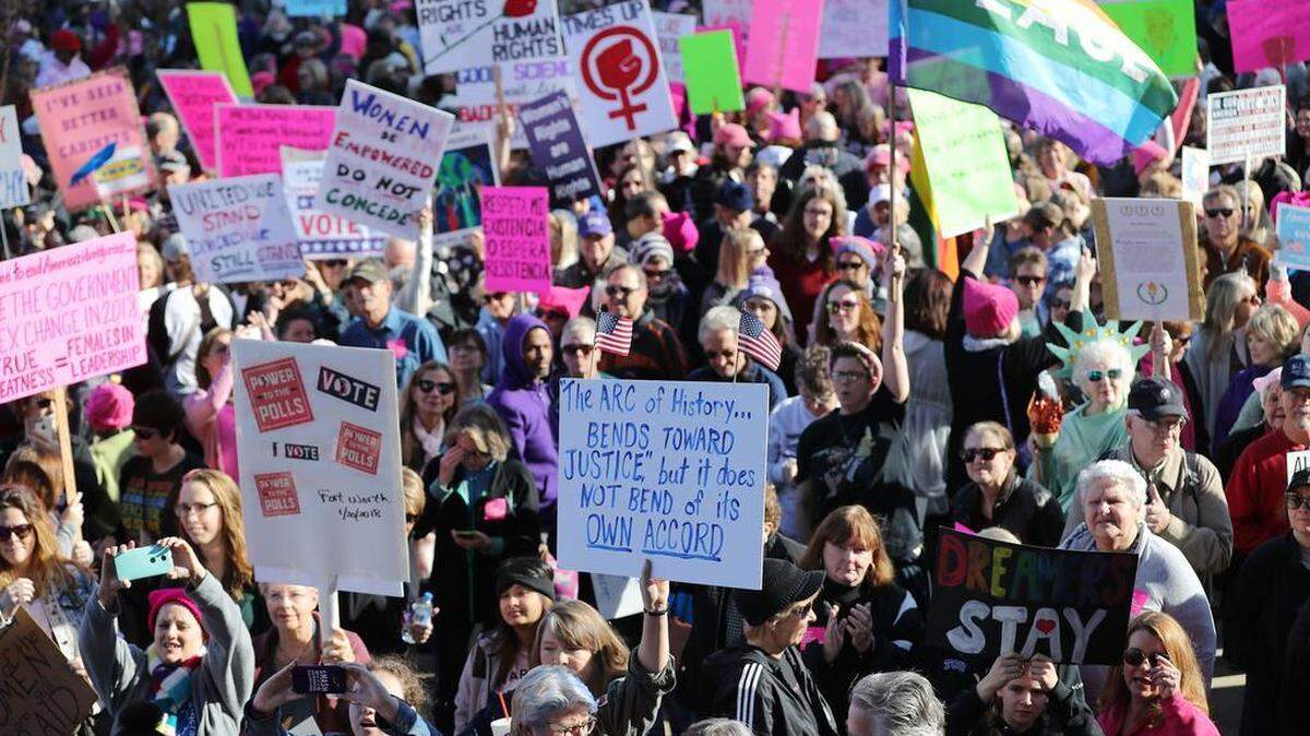 Marchers carried a wide variety of signs in the Women's March in Fort Worth, Saturday, Jan. 20, 2018.
