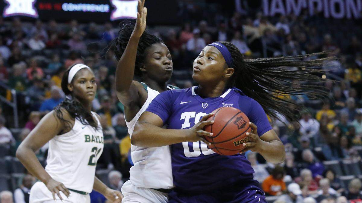 TCU forward Amy Okonkwo, right, had 17 points to help the Frogs to a Big 12 opening victory over West Virginia on Jan. 2, 2019.