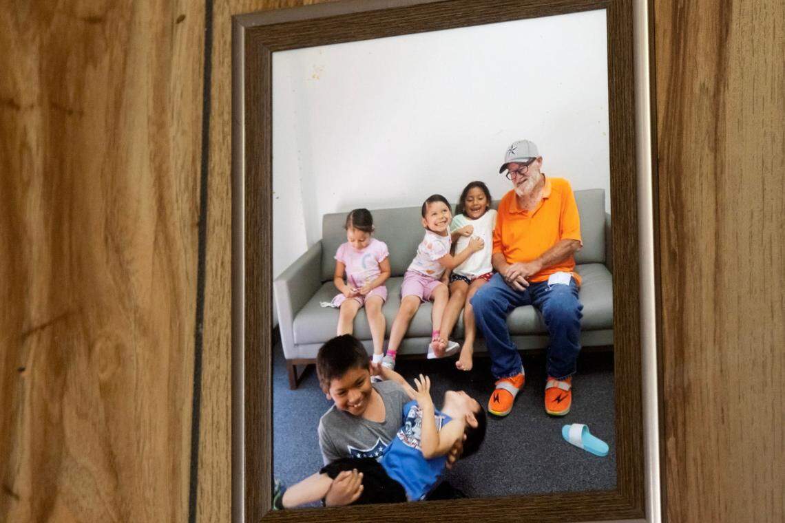 A photo inside Robert Parson’s home that shows him with Cindy Rodriguez-Singh’s children, including Noel Rodriguez-Alvarez in the blue shirt, in Everman, Texas, on Tuesday, March 28, 2023. Noel has not been seen since November 2022, and police thoroughly searched the home during their investigation.