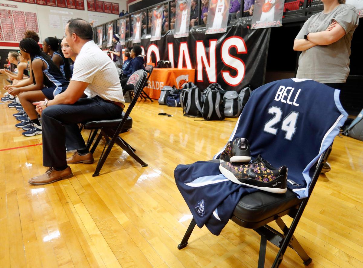 An empty chair sits at the end of the L.D. Bell bench honoring Kobe Bryant in the first quarter of a high school basketball game at Trinity High School in Euless, Texas, Jan. 28, 2020. Bell led 17-6 after one quarter. (Special to the Star-Telegram Bob Booth)