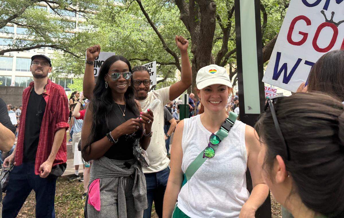 Fort Worth City Council member district 8 Chris Nettle speaks at a rally alongside district 9 council member Elizabeth Beck.