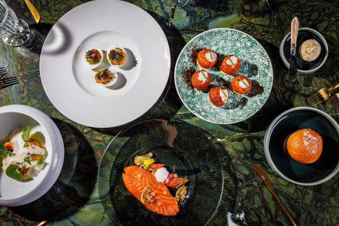 Hush puppies, deviled eggs, scallops and bread and butter are a few of the starters offered at The Mont. The cured ora king salmon is also a dish offered.