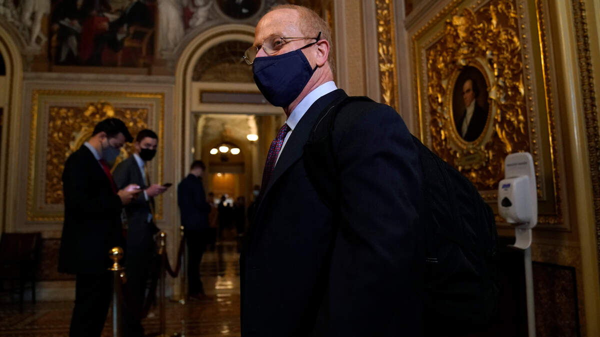 David Schoen, lawyer for former President Donald Trump, talks to the media Tuesday as he walks off the Senate floor after the conclusion of the first day of the second impeachment trial of former President Donald Trump.