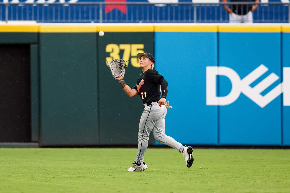 Aledo center fielder Luke Gladchuk (21) makes a catch Montgomery Lake Creek as rain starts to fall in the UIL Class 5A Division I baseball state championship game on Friday, June 5, 2026, at Dell Diamond in Round Rock, Texas.