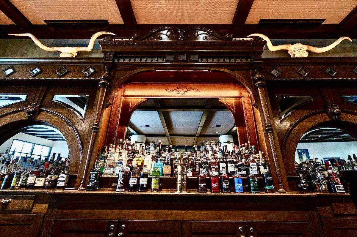 The bar area in the lobby at the Bowie House hotel in Fort Worth on Tuesday, Nov. 28, 2023.