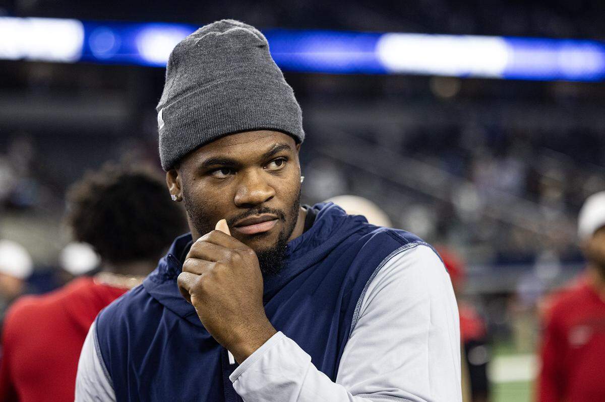 Cowboys defensive end Micah Parsons greets players after an NFL preseason game between the Dallas Cowboys and the Atlanta Falcons at AT&T Stadium in Arlington on Friday, Aug. 22, 2025, 