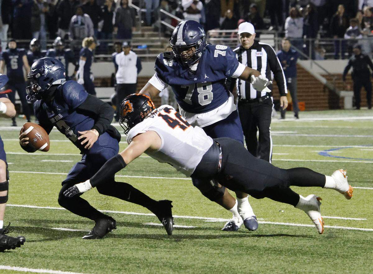 Aledo defensive end Cooper Cyphers (42) makes a diving attempt at Frisco Lone Star quarterback Trey Wright (3) during the second half of a UIL Class 5A Division I Semifinal on Friday Dec. 12, 2025 at Vernon Newsom Stadium in Mansfield, Texas.